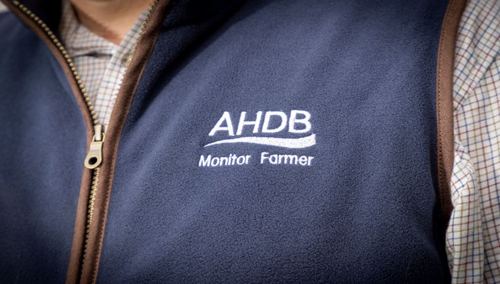 Blue zip top embossed with AHDB Monitor Farme